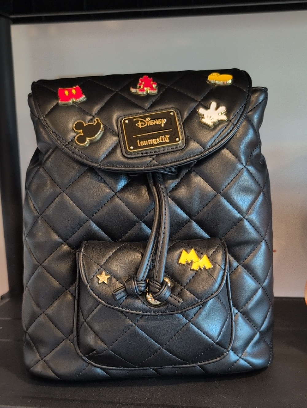 Loungefly Black Quilted Mini Backpack with Disney Pin Accents